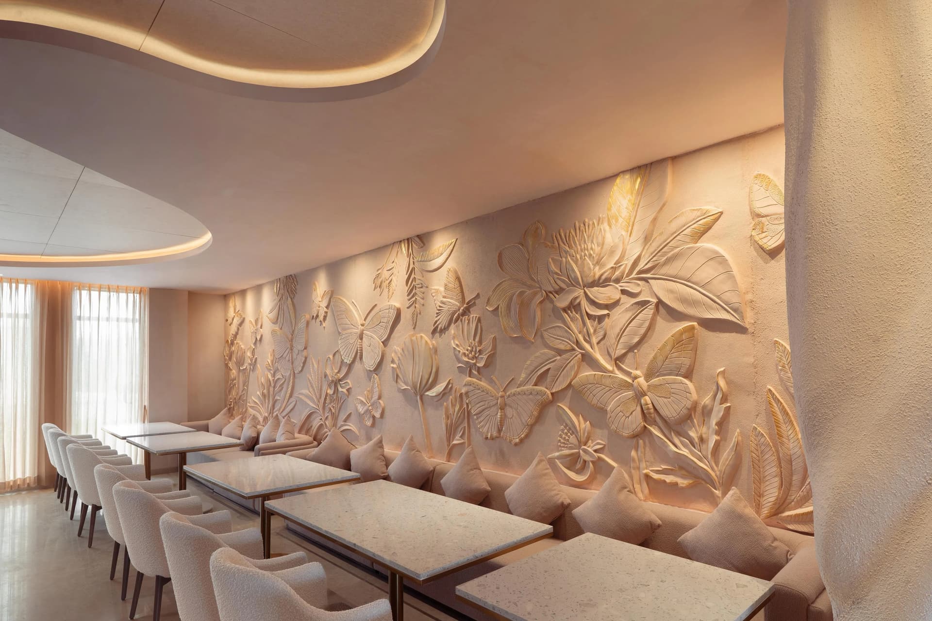 Sculpted floral relief dining room at Canvas